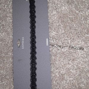 Worn black lace choker